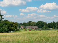 Leben auf einer Ebene: Stilvoller Winkelbungalow in Bendestorf