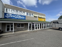 Autohaus mit Kfz-Werkstatt, Verkaufsfläche und Fitnessstudio in Ellerbek
