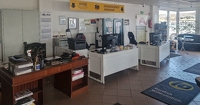 Autohaus mit Kfz-Werkstatt, Verkaufsfläche und Fitnessstudio in Ellerbek